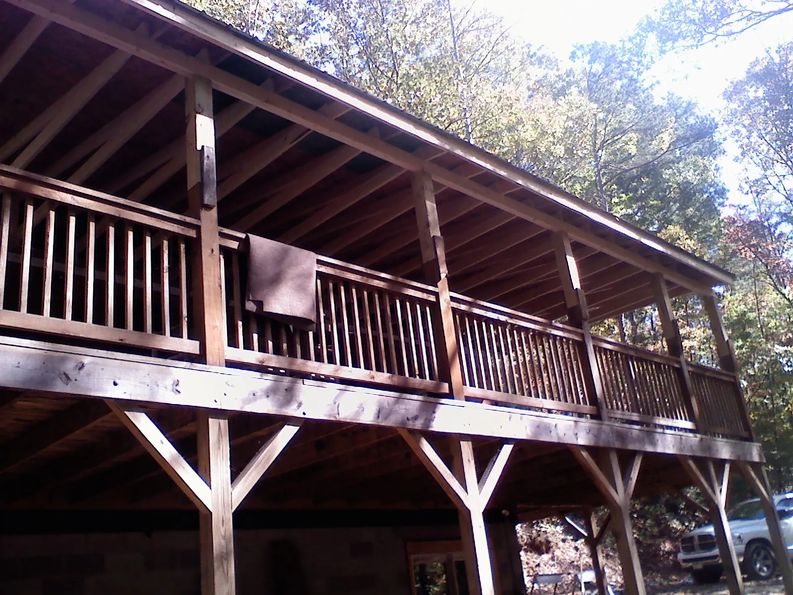 Timber framing under a new elevated porch and deck — Roof Leak Repair in Mineral Point by Roofing Brothers